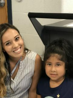 photo of Ms Diaz and student